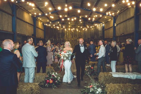 Bright colorful modern wedding flowers Barn wedding